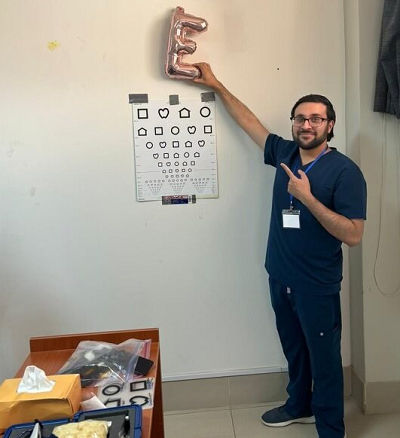 Image Resident standing at Eye Chart - Peru