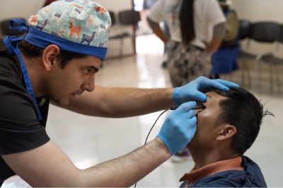 Physician examining patient
