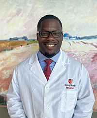 doctor in white coat Jordan Price