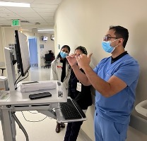 doctor in masks and blue scrubs doctor in masks and blue scrubs