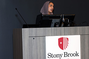 Resident lecturing at Residents Research Day