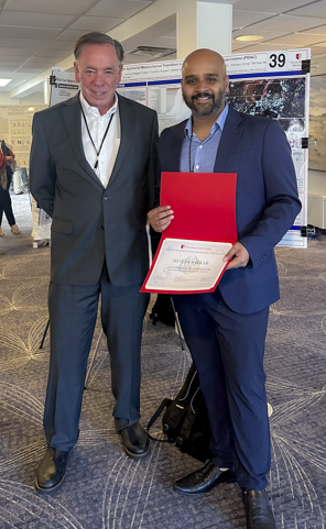Dr. Kenneth Shroyer & Shayan Sarkar Posing After Winning Award