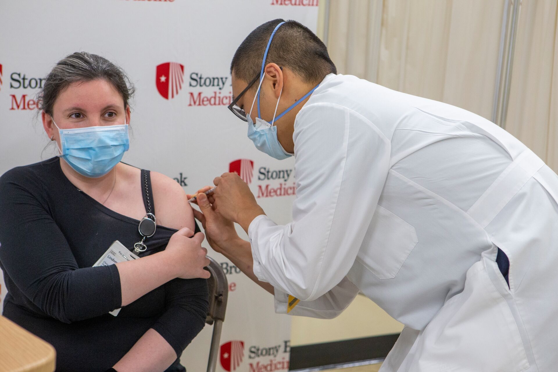 student getting vaccine