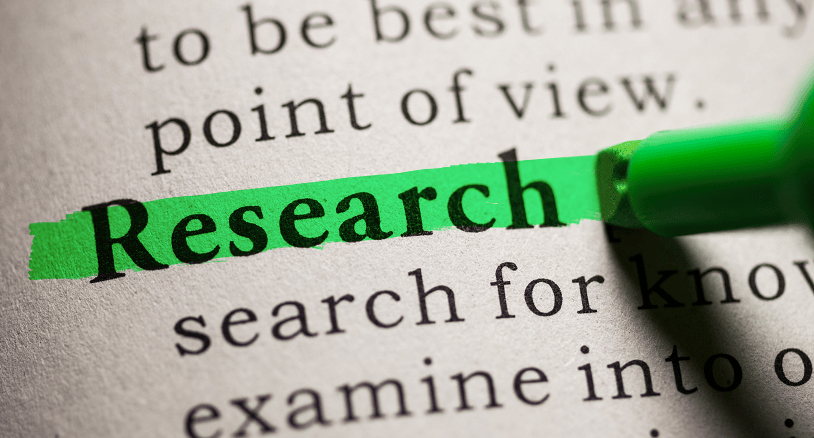 Green highlighter runs through the word Research on a dictionary page